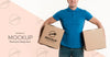 Delivery Man Holding Boxes On His Hips Psd