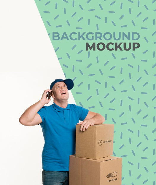Delivery Man Talking On The Phone Next To A Bunch Of Boxes Psd