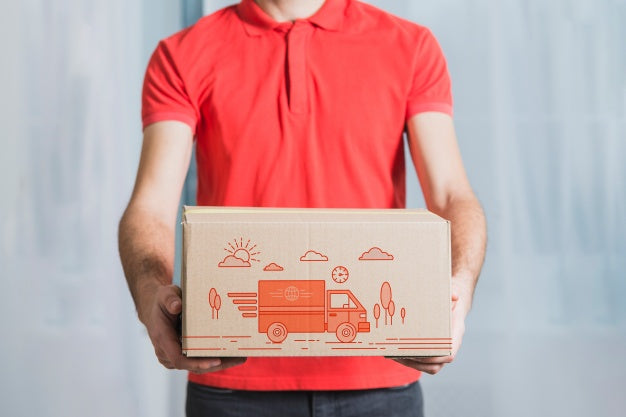 Delivery Mockup With Man Holding Box Psd