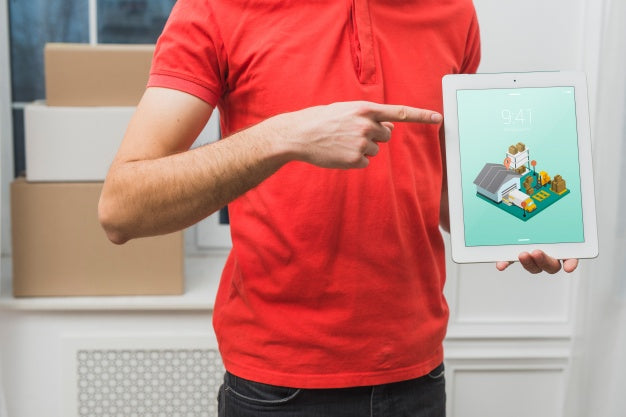 Delivery Mockup With Man Holding Tablet Psd