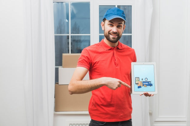 Delivery Mockup With Man Holding Tablet Psd