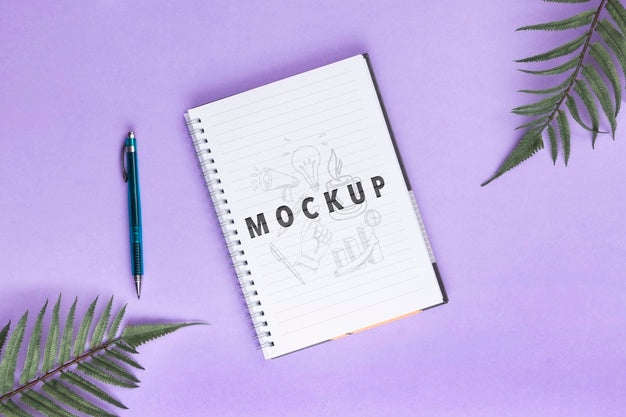 Desk Concept With Notebook And Pen On Table Psd