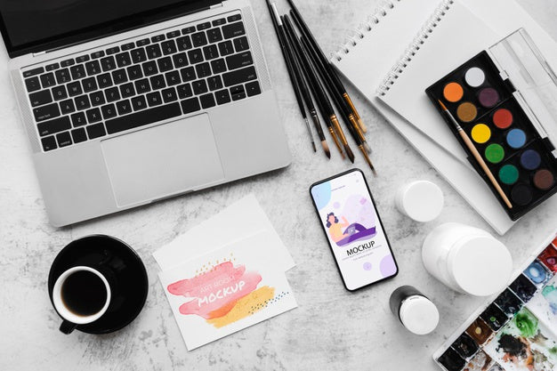 Desk Of Painting Artist With Laptop Psd