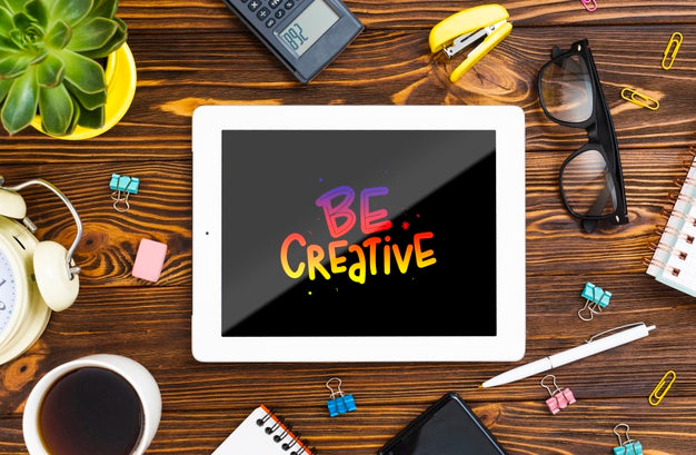 Desk View With Positive Message On Chalkboard Psd