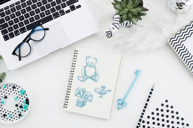 Desk With Notebook Mock-Up And Glasses Psd