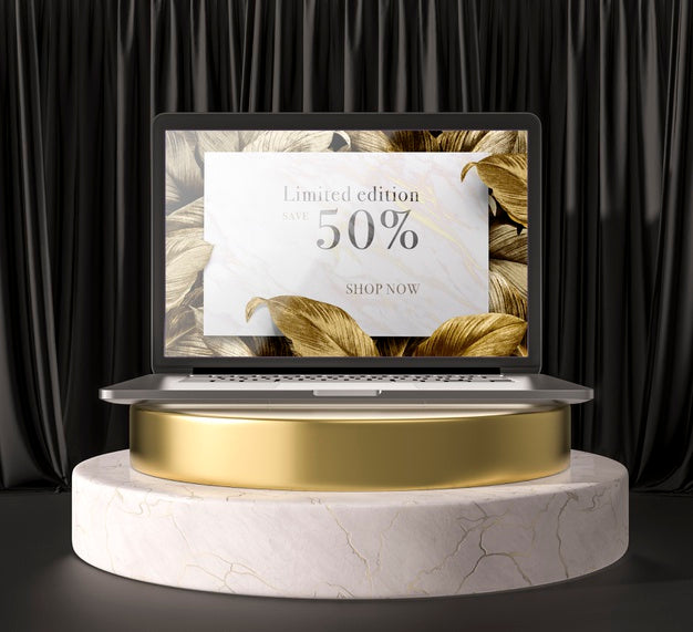 Digital Tablet With Golden Leaves On A Holder Psd