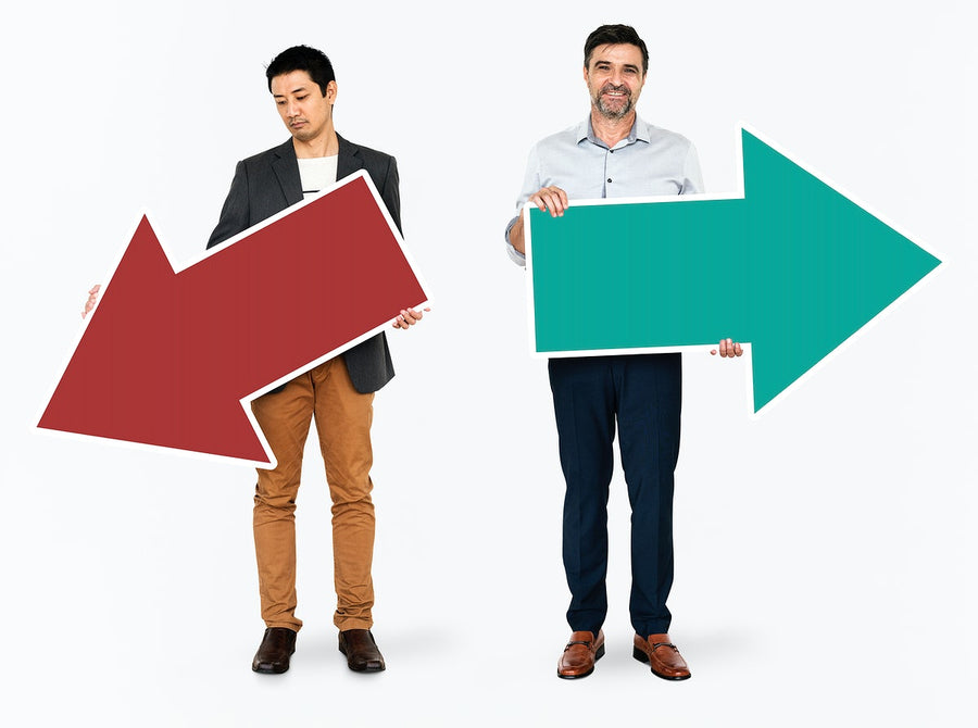 Diverse People Holding Positive And Negative Arrows