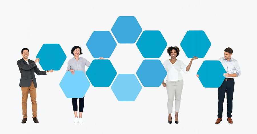 Diverse People Showing Blue Hexagon Shaped Boards