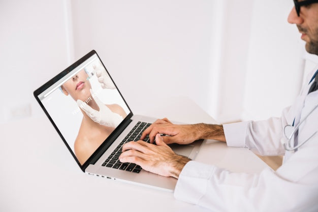 Doctor Working With Laptop Psd