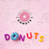 Donut And Letters Arrangement With Mock-Up Psd