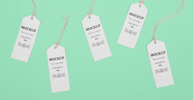 Eco Tags Assortment On Green Background Psd