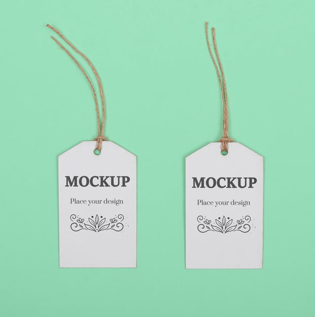 Eco Tags On Green Background Top View Psd
