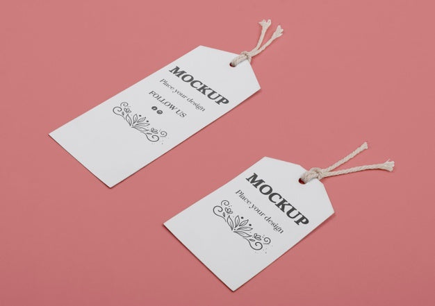 Eco Tags On Pink Background High Angle Psd