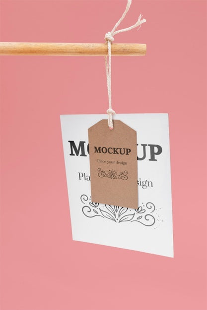 Ecological Tags Hanging With Pink Background Psd