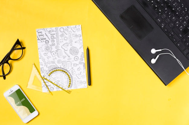 Electronic Laptop On Workspace And Paper Sheets Psd