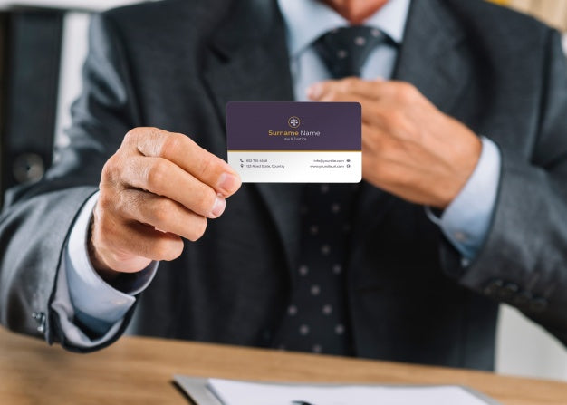 Elegant Businessman Presenting Business Card Mocku Psd