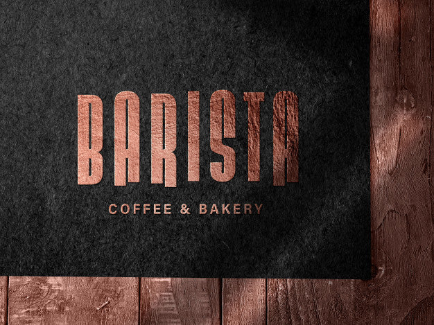 Embossed Bronze Logo Mockup On Dark Paper Psd