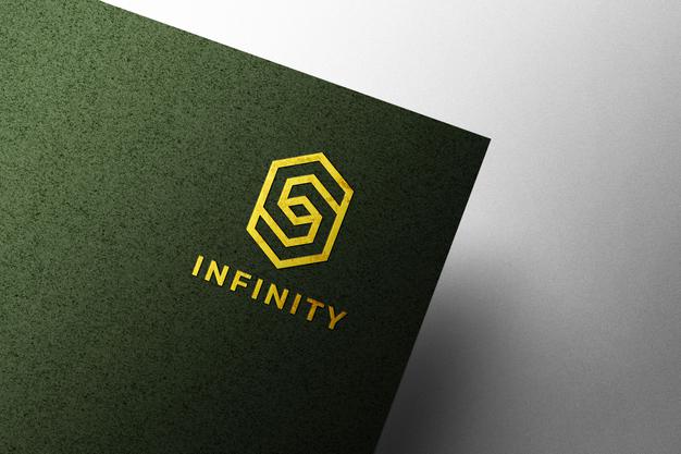 Embossed Golden Logo Mockup On Green Kraft Paper Psd