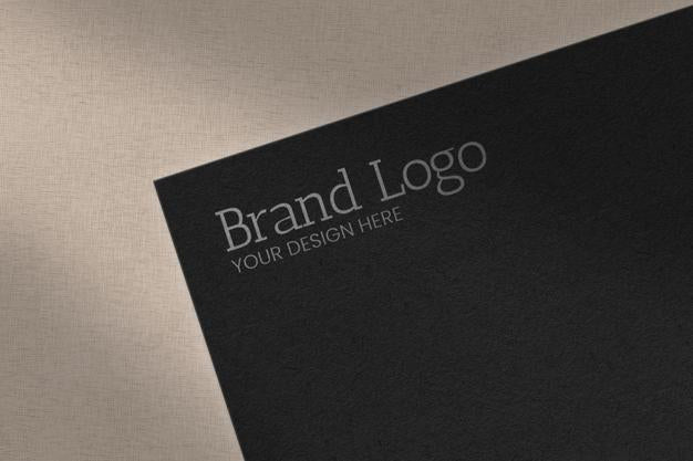 Embossed Logo Text With Shadows In Marble Surface Mockup Psd