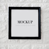 Empty Square Frame For Mock Up On A Brick Wall Psd