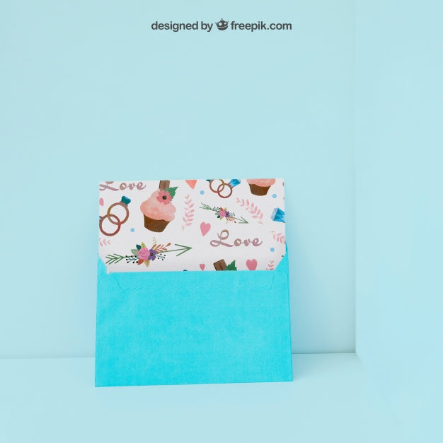 Envelope And Card Leaning Against Wall Psd