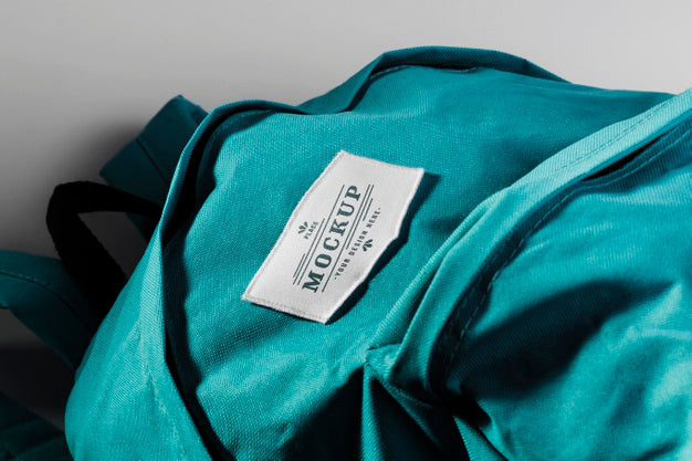 Fabric Clothing Patch Mock-Up On Blue Backpack Psd