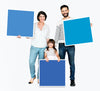 Family Holding Blue Square Boards