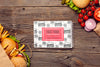 Fast Food And Veggies On Wooden Background Psd