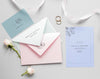 Fat Lay Of Wedding Card With Envelopes And Roses Psd