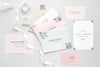 Fat Lay Of Wedding Card With Ribbon And Rings Psd