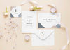 Fat Lay Of Wedding Cards With Roses And Candles Psd