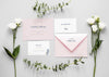 Fat Lay Of Wedding Cards With Roses And Plants Psd