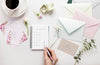 Fat Lay Of Wedding Notebook With Envelopes And Flowers Psd