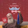 Father Holding Tie And Cardboard Mock-Up On Burgundy Background Psd