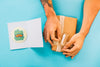 Fathers Day Mockup With Card And Hands Preparing Present Box Psd