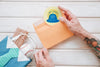 Fathers Day Mockup With Round Label In Envelope And Arms Psd