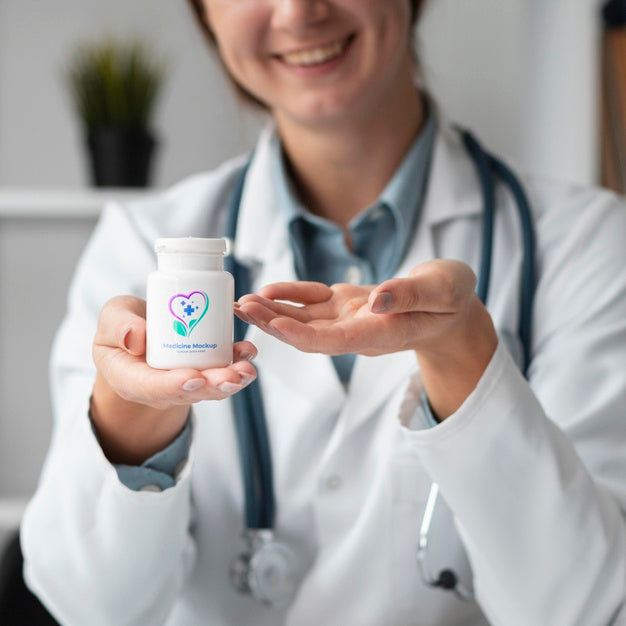 Female Doctor Holding A Mock-Up Medicine Bottle Psd