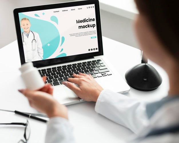 Female Doctor Working On A Mock-Up Laptop Psd