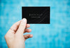 Female Hand Holding A Business Card Mockup