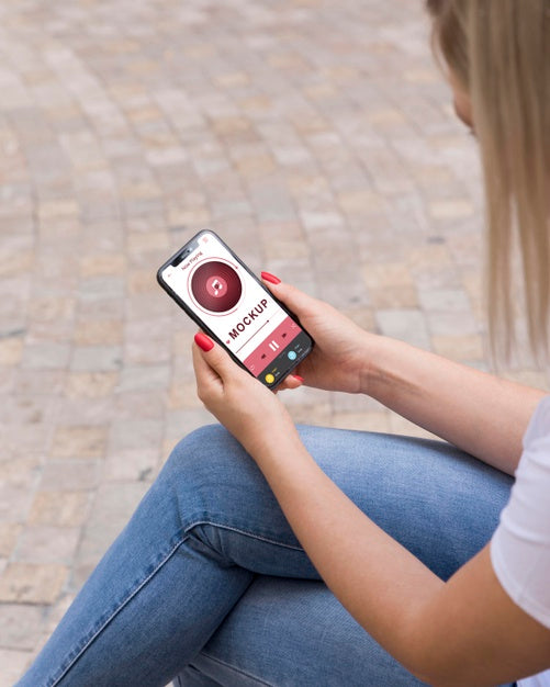 Female On Street Reading Book On Phone Psd