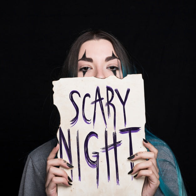 Female Vampire Holding Paper With Lettering Psd