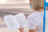 Female With Mask On Street Reading Book Psd