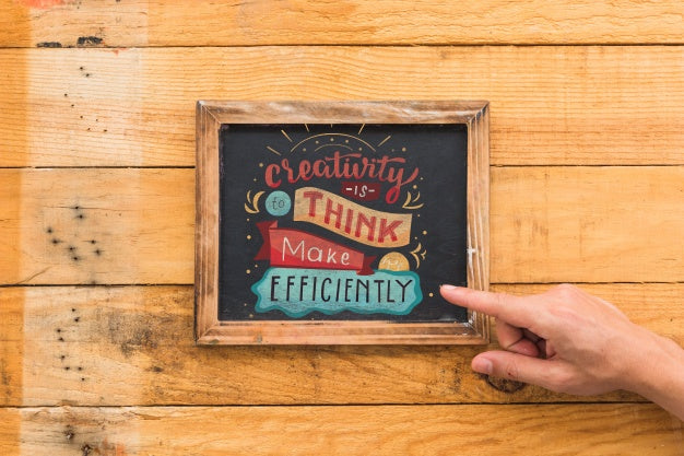 Finger Pointing At Slate Mockup Psd