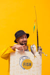 Fisherman In Raincoat Holding Rod With Fish Psd