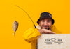 Fisherman In Raincoat Mock-Up And Fish Psd