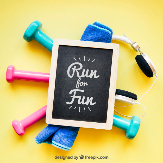 Fitness Mockup With Slate On Dumbbells Psd