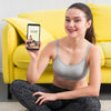 Fitness Woman Holding A Mobile Phone Mock-Up Psd