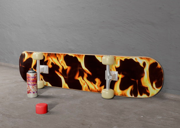 Flame Design Skateboard Next To Spray Can Psd