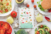 Flat Lay Arrangement With Healthy Food And Notebook Psd