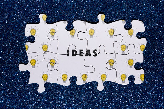 Flat Lay Arrangement With Puzzle On Glitter Background Psd